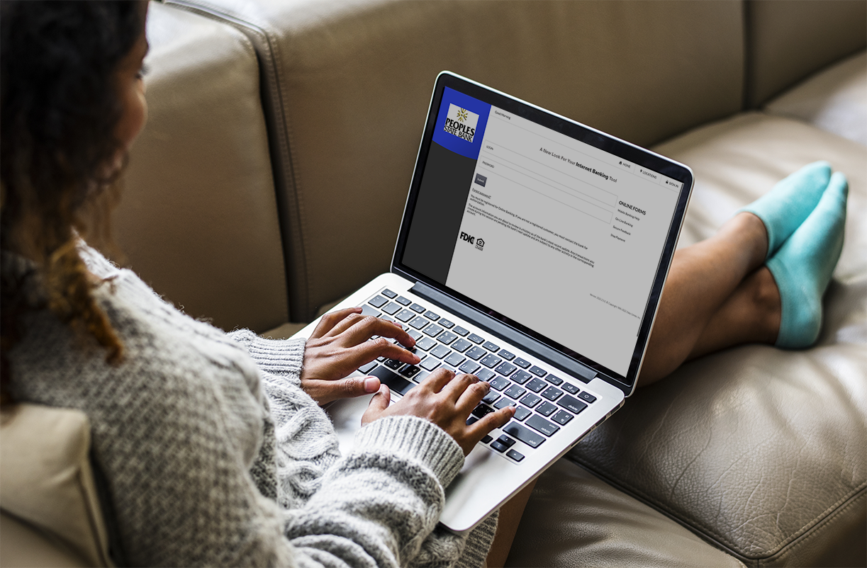 Woman using online banking on laptop